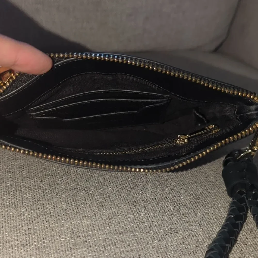 BCBGMaxAzria Black and Gold Wristlet Clutch